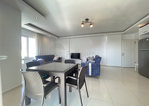 Spacious two-bedroom apartment with a large balcony and sea view