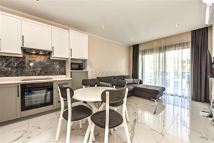 1+1 apartment for rent in a new complex in Kargicak district