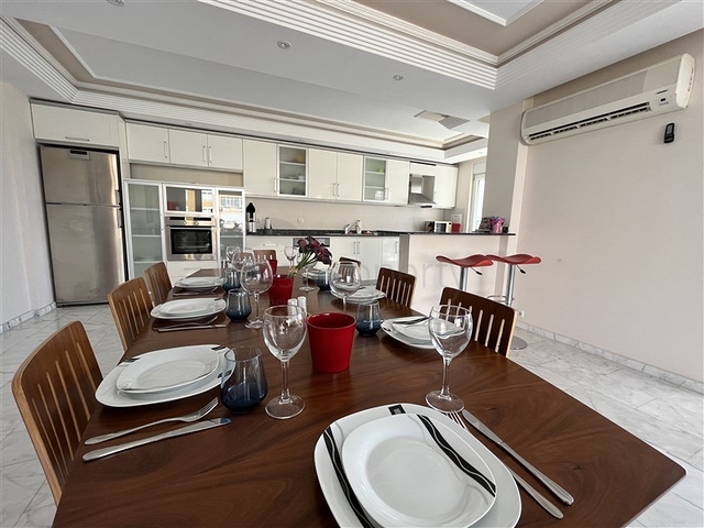 3+1 apartment in Tosmur area 50m from the sea.