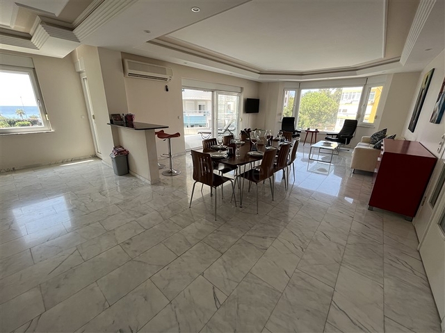 3+1 apartment in Tosmur area 50m from the sea.