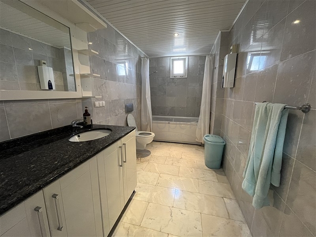 3+1 apartment in Tosmur area 50m from the sea.