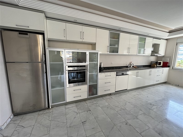 3+1 apartment in Tosmur area 50m from the sea.