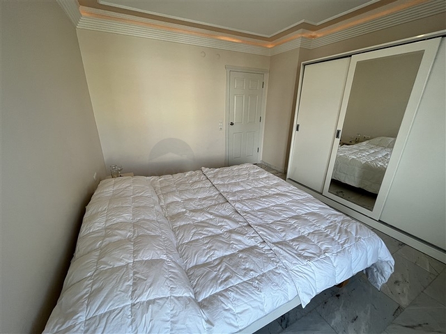 3+1 apartment in Tosmur area 50m from the sea.