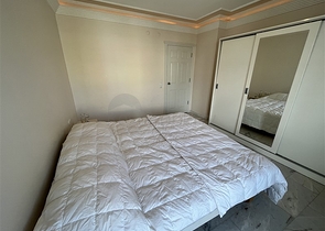 3+1 apartment in Tosmur area 50m from the sea.