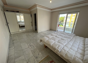 3+1 apartment in Tosmur area 50m from the sea.