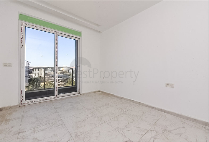 1+1 apartment in a new complex in Avsallar district