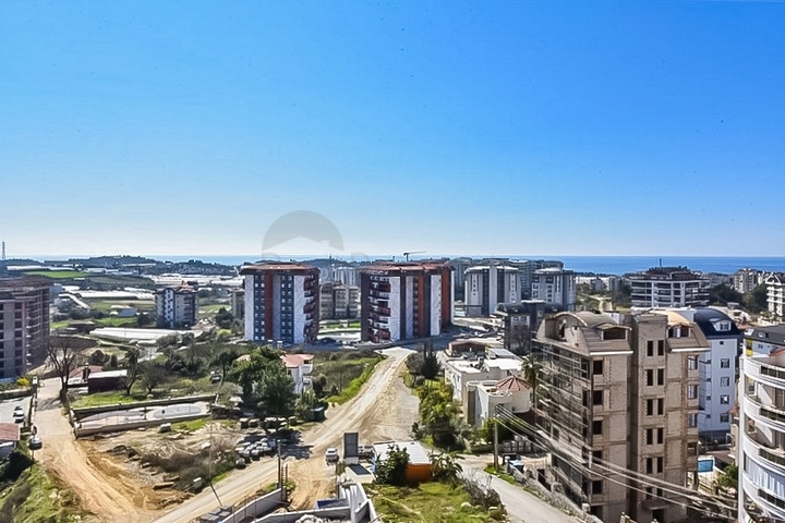 1+1 apartment in a new complex in Avsallar district