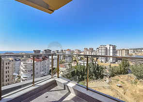 1+1 apartment in a new complex in Avsallar district