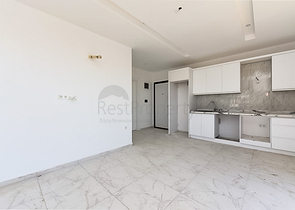 1+1 apartment in a new complex in Avsallar district