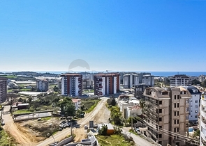 1+1 apartment in a new complex in Avsallar district
