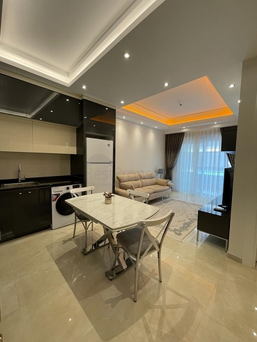 One-bedroom furnished apartment in a new complex in Mahmutlar