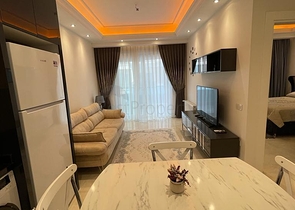 One-bedroom furnished apartment in a new complex in Mahmutlar