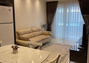 One-bedroom furnished apartment in a new complex in Mahmutlar