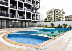 Bright one-bedroom apartment with mountain and sea views