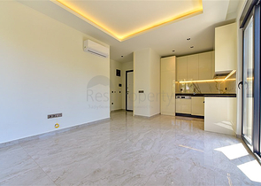 1+1 apartment in a new complex just 400 m from the sea in the center of Alanya 
