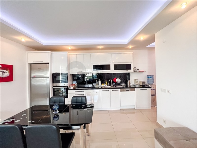 Spacious two-bedroom apartment with a beautiful view of the pool