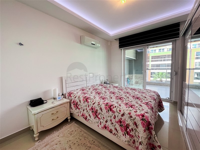 Spacious two-bedroom apartment with a beautiful view of the pool