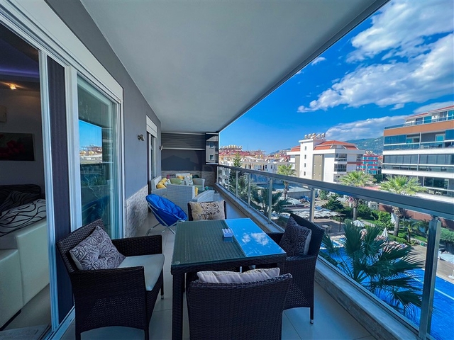 Spacious two-bedroom apartment with a beautiful view of the pool