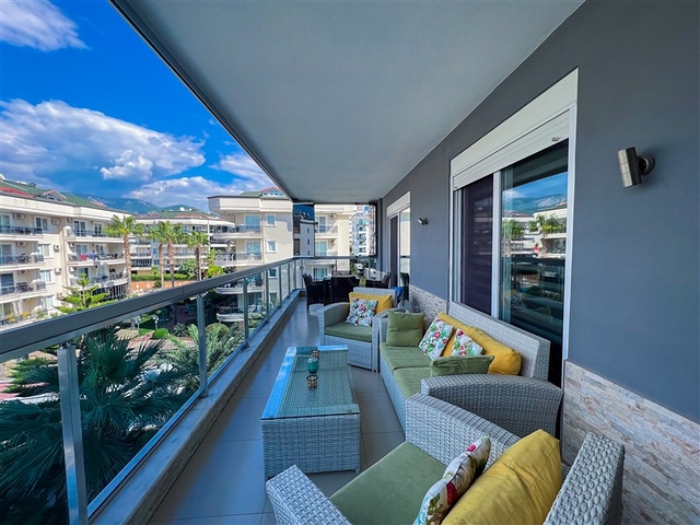 Spacious two-bedroom apartment with a beautiful view of the pool