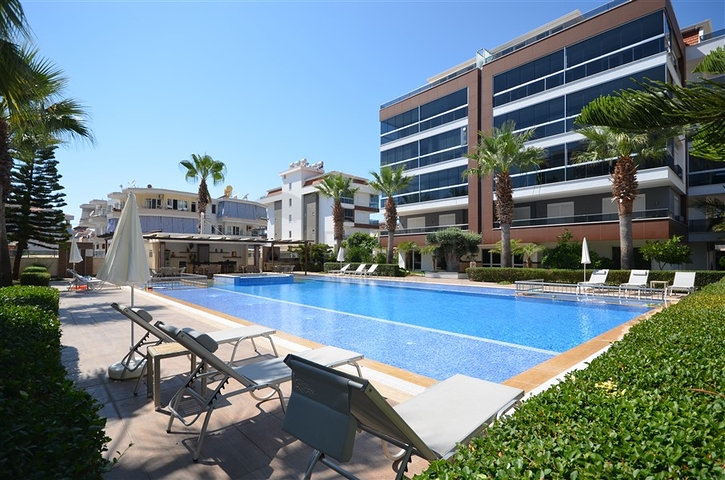 Spacious two-bedroom apartment with a beautiful view of the pool