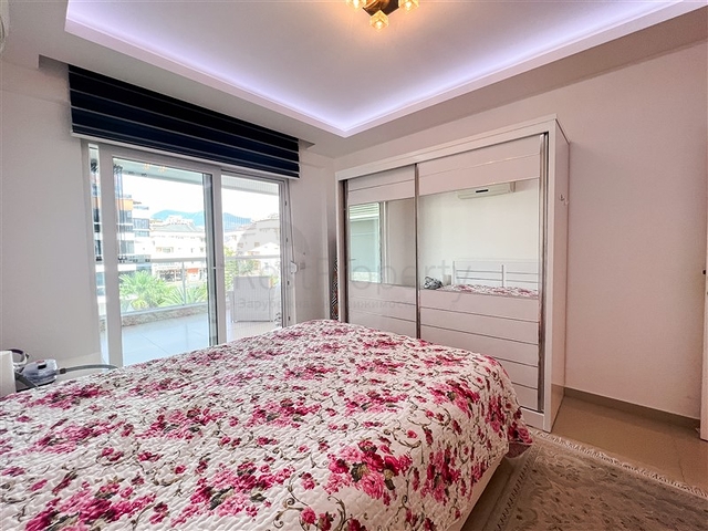 Spacious two-bedroom apartment with a beautiful view of the pool