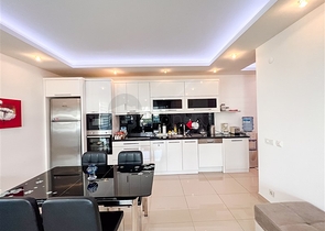 Spacious two-bedroom apartment with a beautiful view of the pool