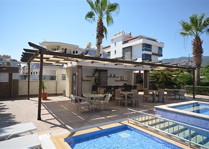 Spacious two-bedroom apartment with a beautiful view of the pool