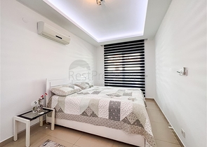 Spacious two-bedroom apartment with a beautiful view of the pool