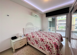 Spacious two-bedroom apartment with a beautiful view of the pool