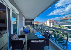 Spacious two-bedroom apartment with a beautiful view of the pool