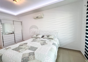 Spacious two-bedroom apartment with a beautiful view of the pool