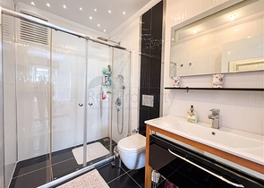 Spacious two-bedroom apartment with a beautiful view of the pool