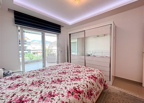 Spacious two-bedroom apartment with a beautiful view of the pool