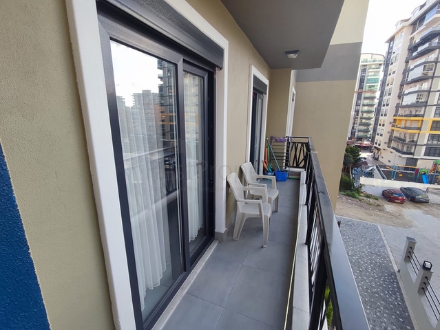 1+1 apartment with furniture and appliances in Mahmutlar district