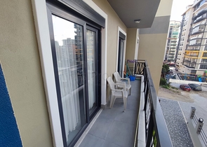 1+1 apartment with furniture and appliances in Mahmutlar district