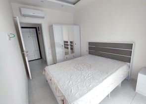 1+1 apartment with furniture and appliances in Mahmutlar district