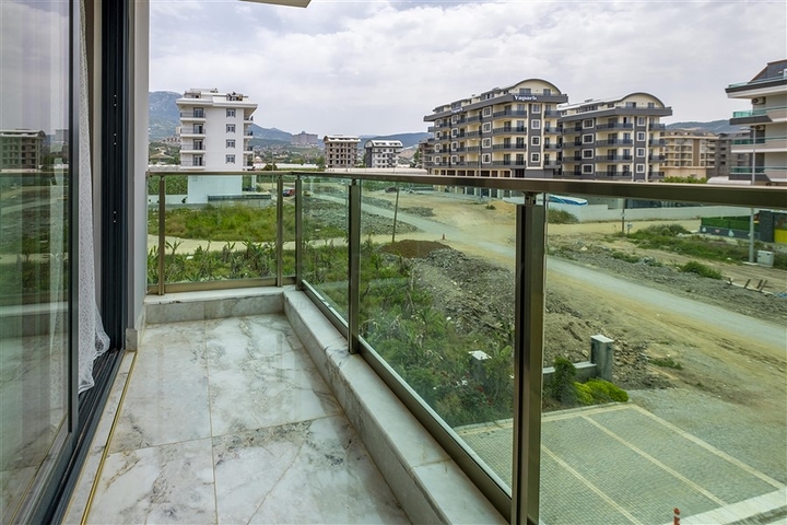 Furnished 2+1 apartment in a new complex in Kargicak district