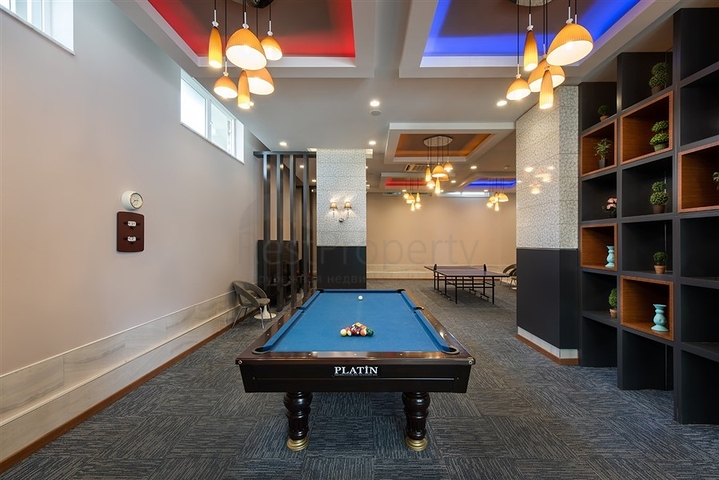 2+1 apartment in a complex with hotel infrastructure in Avsallar district