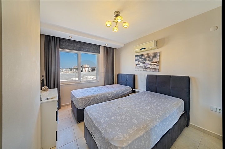 2+1 apartment in a complex with hotel infrastructure in Avsallar district