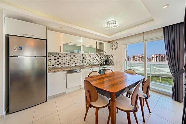 2+1 apartment in a complex with hotel infrastructure in Avsallar district