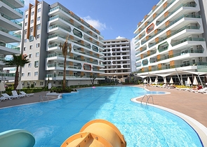 2+1 apartment in a complex with hotel infrastructure in Avsallar district