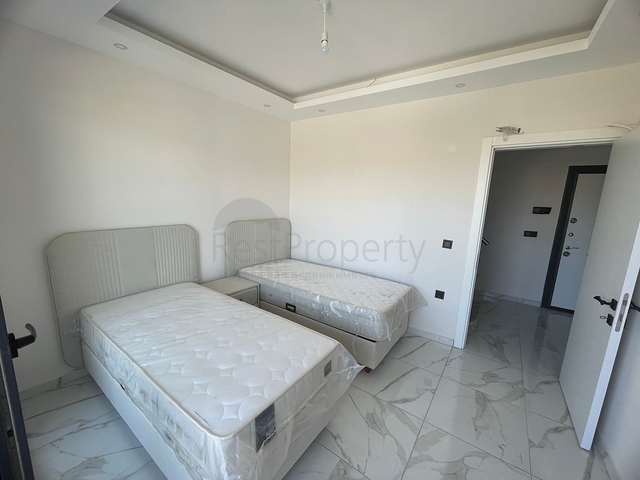 Furnished two-bedroom apartment in a new building in Gazipasa district