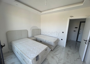 Furnished two-bedroom apartment in a new building in Gazipasa district
