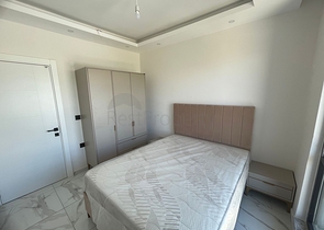 Furnished two-bedroom apartment in a new building in Gazipasa district