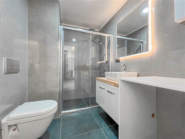 1+1 Apartment with Private Terrace in Oba Alanya