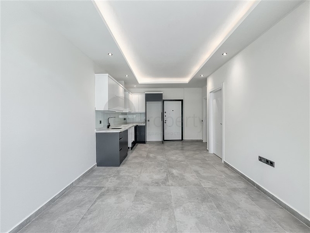 1+1 Apartment with Private Terrace in Oba Alanya