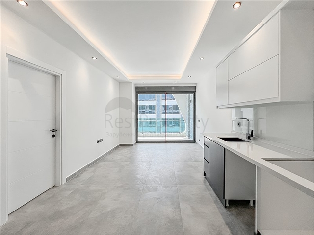 1+1 Apartment with Private Terrace in Oba Alanya