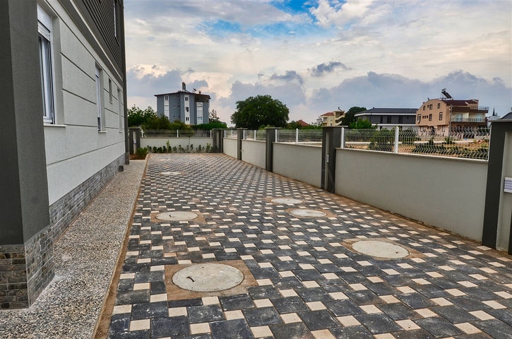 A building with 4 apartments in the area of Doshemealti - Antalya 