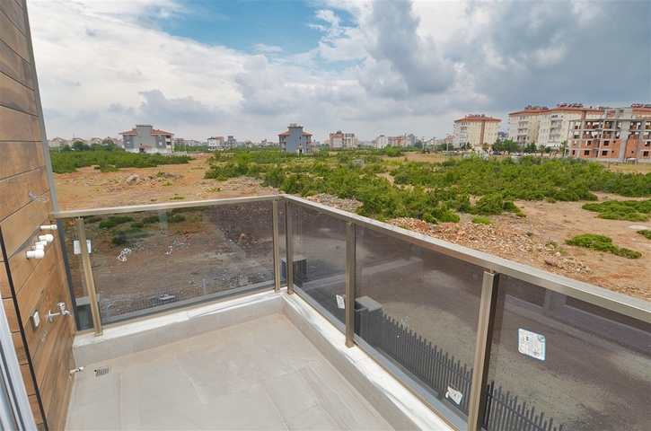 A building with 4 apartments in the area of Doshemealti - Antalya 