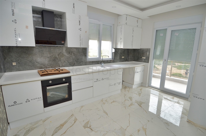 A building with 4 apartments in the area of Doshemealti - Antalya 
